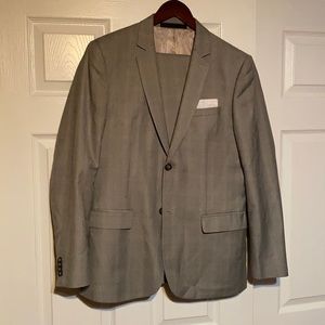 Top man grey plaid box stripe suit